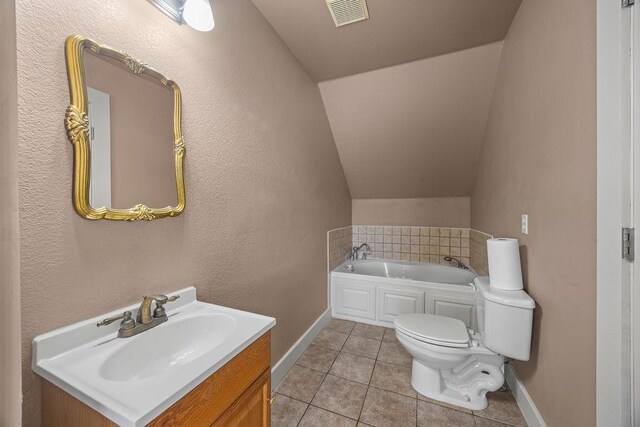 815 James Pl, West Fork, AR 72774 - bathroom featuring toilet, tile patterned floors, a bath, lofted ceiling, and vanity