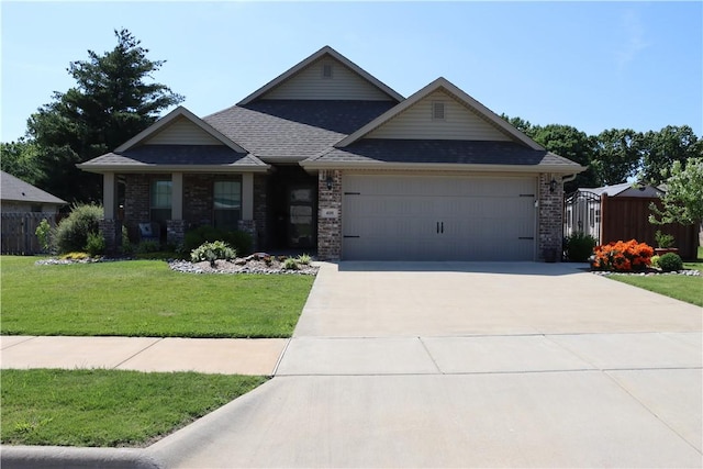400 Fox Cir, Pea Ridge, AR 72751 - view of front of property featuring an attached garage, brick siding, driveway, and roof with shingles