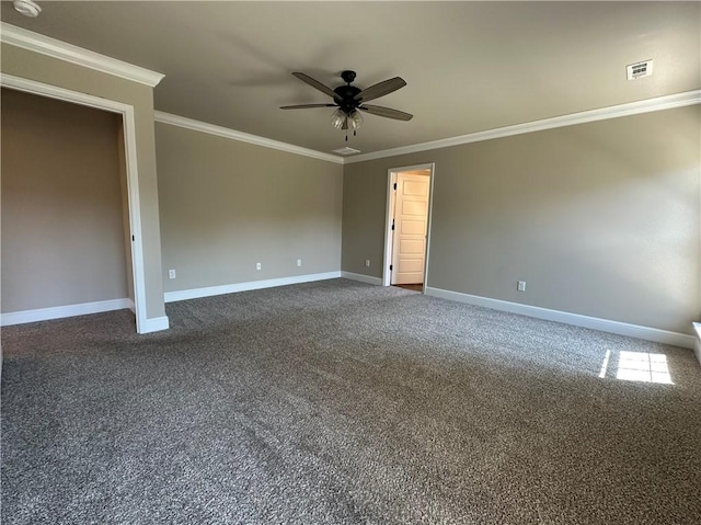 400 Fox Cir, Pea Ridge, AR 72751 - empty room with crown molding, a ceiling fan, baseboards, and dark colored carpet