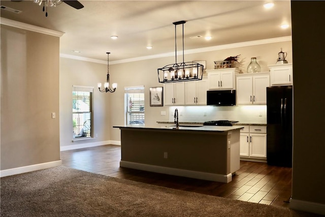 400 Fox Cir, Pea Ridge, AR 72751 - kitchen with black appliances, a chandelier, a sink, white cabinetry, and crown molding