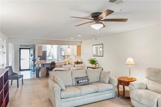 350 S Wildwood Dr Unit C15, Branson, MO 65616 - living area featuring light carpet, ceiling fan, recessed lighting, and a textured ceiling