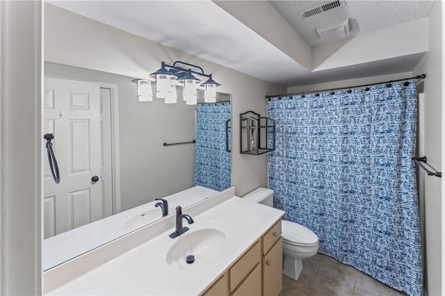 350 S Wildwood Dr Unit C15, Branson, MO 65616 - bathroom featuring toilet, vanity, tile patterned floors, and curtained shower