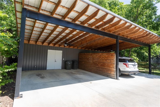808 S Locust Ave, Fayetteville, AR 72701 - view of parking with a carport, concrete driveway, and a ceiling fan
