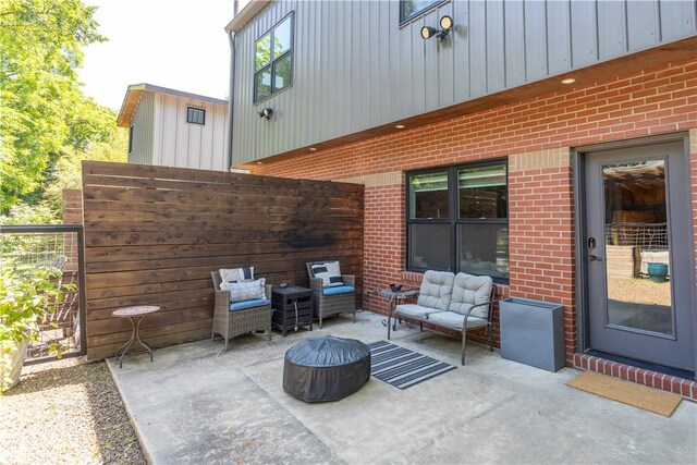 808 S Locust Ave, Fayetteville, AR 72701 - view of patio featuring a fire pit
