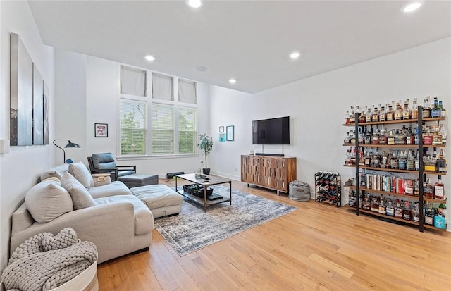 429 SW B St, Bentonville, AR 72712 - living room featuring wood-type flooring, recessed lighting, and baseboards
