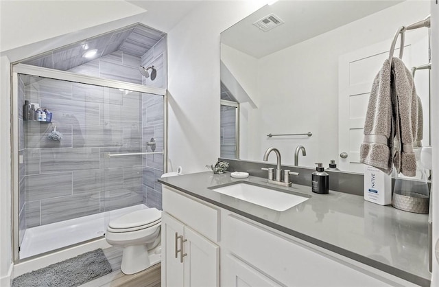 429 SW B St, Bentonville, AR 72712 - full bath with toilet, vanity, and a stall shower