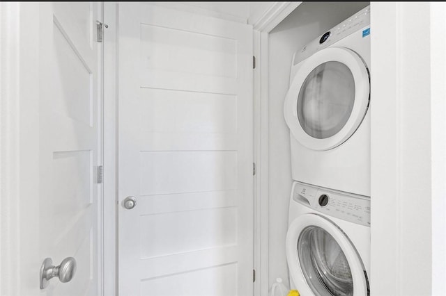 429 SW B St, Bentonville, AR 72712 - laundry area featuring stacked washer / drying machine