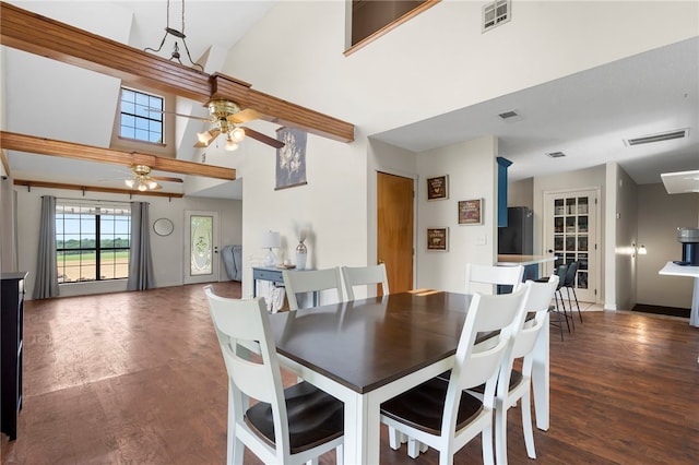 13004 Canehill Rd, Lincoln, AR 72744 - dining area with a ceiling fan, wood finished floors, baseboards, and a high ceiling