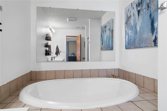 13004 Canehill Rd, Lincoln, AR 72744 - bathroom with a garden tub and a textured ceiling
