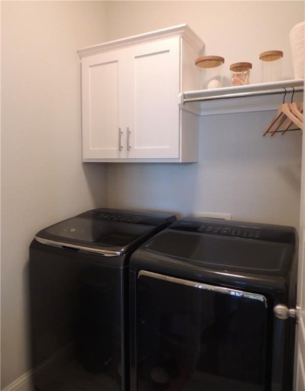 1601 Cavern Springs Way, Cave Springs, AR 72718 - laundry room featuring washing machine and clothes dryer and cabinet space