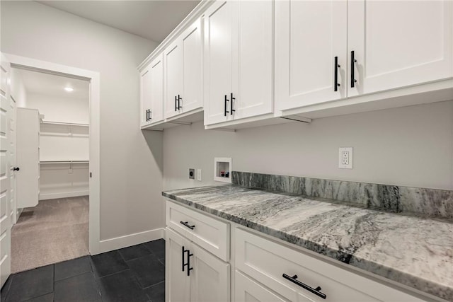 1221 Red Maple St, Centerton, AR 72719 - washroom featuring washer hookup, cabinet space, electric dryer hookup, dark tile patterned flooring, and dark colored carpet
