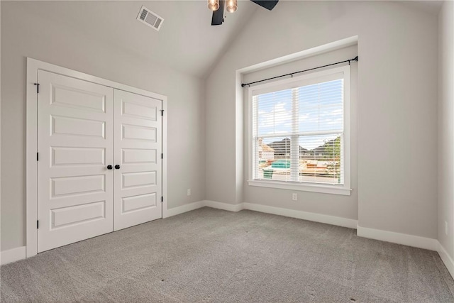 1221 Red Maple St, Centerton, AR 72719 - unfurnished bedroom featuring carpet flooring, lofted ceiling, baseboards, and a closet