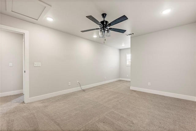 1221 Red Maple St, Centerton, AR 72719 - empty room featuring light carpet, attic access, recessed lighting, baseboards, and a ceiling fan