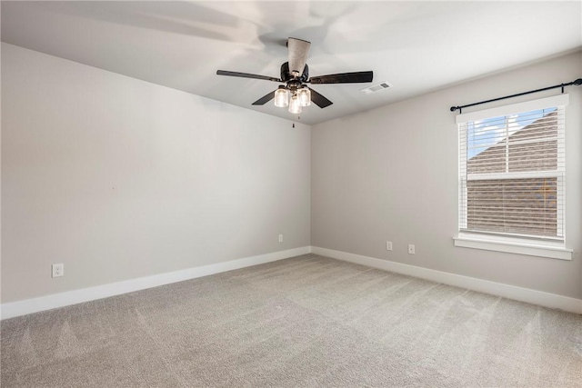 1221 Red Maple St, Centerton, AR 72719 - spare room with light colored carpet, baseboards, and a ceiling fan