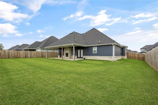 1221 Red Maple St, Centerton, AR 72719 - back of house with a patio and roof with shingles