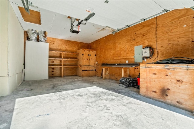 11648 Ventris Rd, Garfield, AR 72732 - garage with a garage door opener and electric panel
