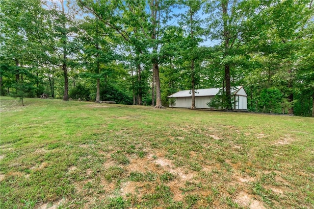 11648 Ventris Rd, Garfield, AR 72732 - view of grassy yard with an outdoor structure and an outbuilding