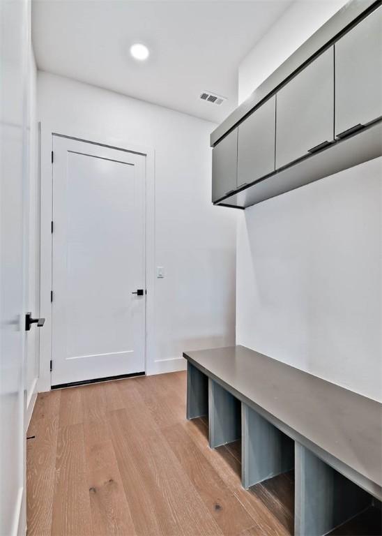 1 Breeghle Ln, Bella Vista, AR 72714 - mudroom with light wood-style floors and recessed lighting