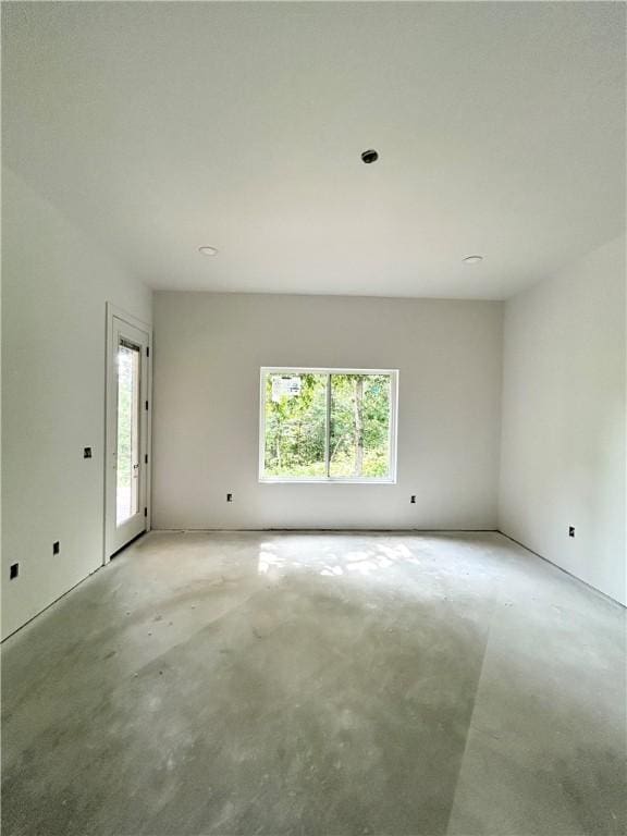 1 Breeghle Ln, Bella Vista, AR 72714 - empty room with concrete floors