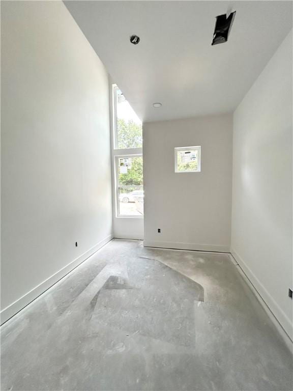 1 Breeghle Ln, Bella Vista, AR 72714 - empty room with concrete flooring and baseboards