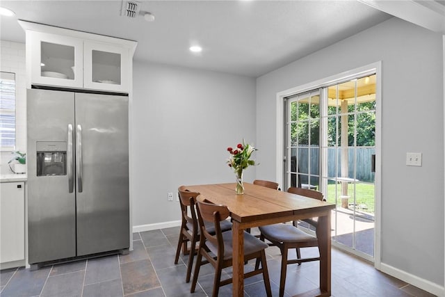 704 Del Cir, Lowell, AR 72745 - dining space with baseboards and recessed lighting