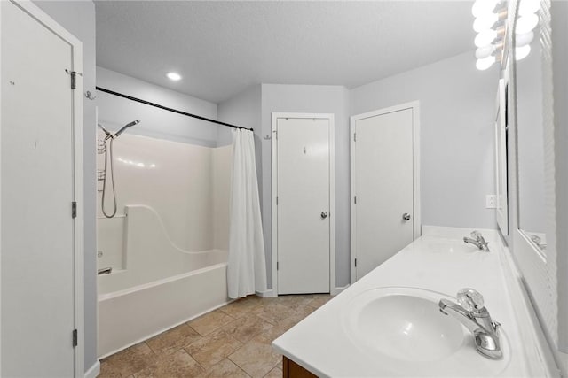 704 Del Cir, Lowell, AR 72745 - full bath with double vanity, shower / bath combo, and recessed lighting