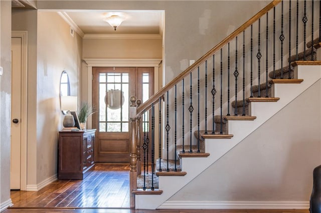8266 Anna Maria Ave, Springdale, AR 72762 - entrance foyer featuring dark wood finished floors, crown molding, stairway, and baseboards