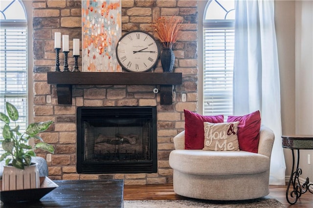 8266 Anna Maria Ave, Springdale, AR 72762 - living room featuring a stone fireplace and wood finished floors