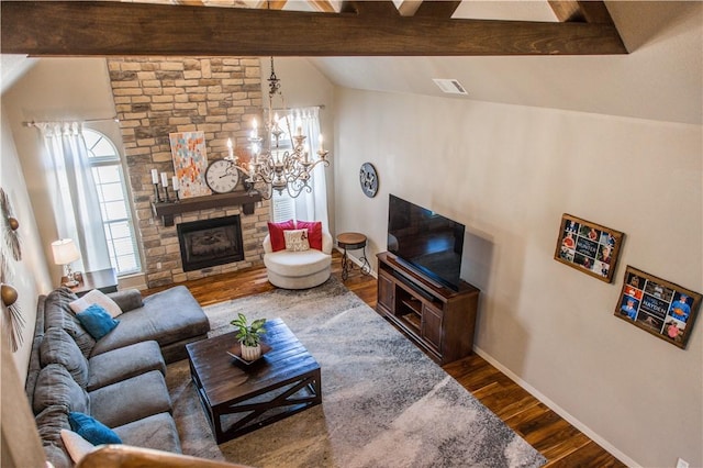 8266 Anna Maria Ave, Springdale, AR 72762 - living room featuring wood finished floors, a fireplace, baseboards, and a chandelier