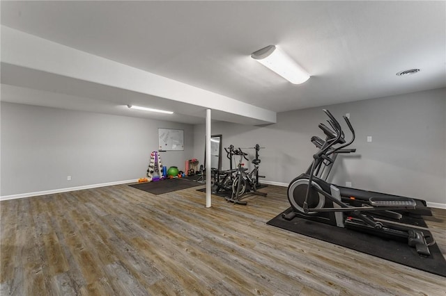 21 Chudleigh Ln, Bella Vista, AR 72714 - exercise area featuring wood finished floors and baseboards