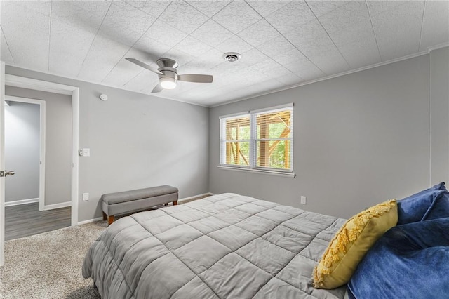 21 Chudleigh Ln, Bella Vista, AR 72714 - carpeted bedroom featuring baseboards and a ceiling fan