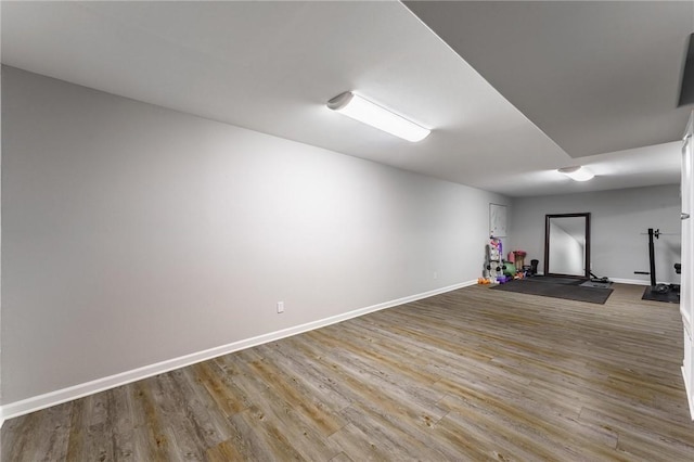 21 Chudleigh Ln, Bella Vista, AR 72714 - basement featuring wood finished floors and baseboards