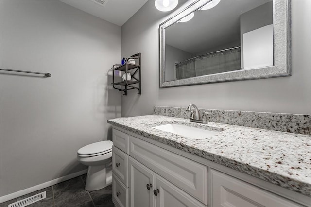 21 Chudleigh Ln, Bella Vista, AR 72714 - bathroom with vanity, toilet, baseboards, and tile patterned floors