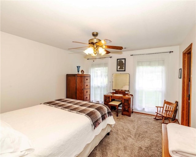 518 W Aster Ave, Farmington, AR 72730 - bedroom with light carpet and a ceiling fan