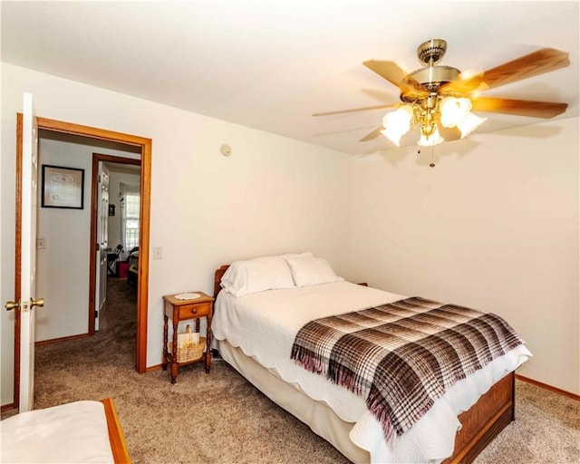 518 W Aster Ave, Farmington, AR 72730 - bedroom with light colored carpet, baseboards, and a ceiling fan
