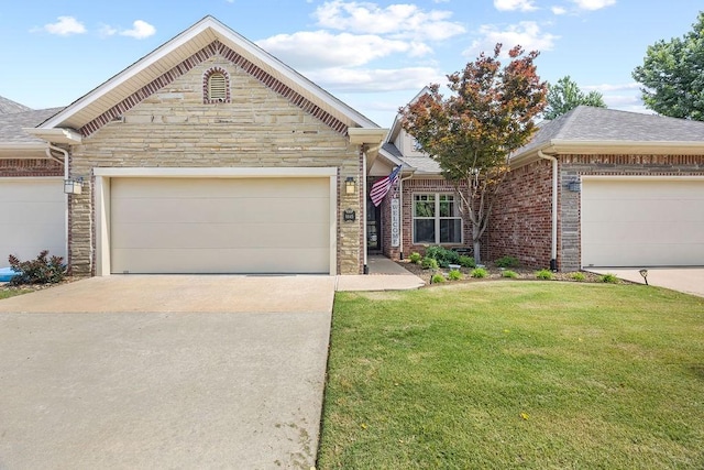 6645 Valley View Rd, Rogers, AR 72758 - view of front of property with stone siding, a front yard, a shingled roof, concrete driveway, and an attached garage