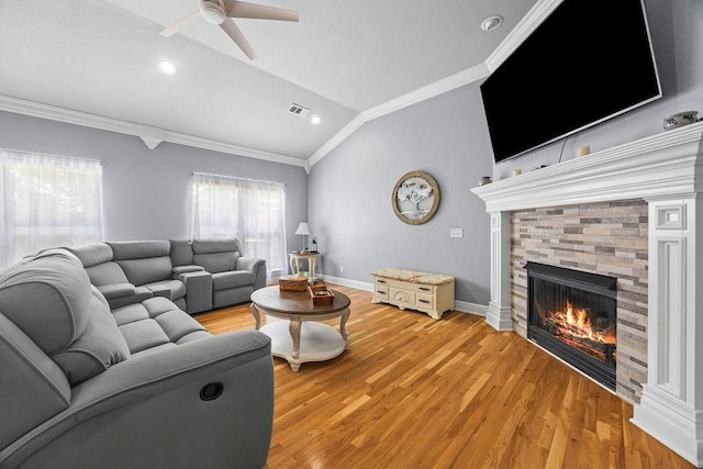 6645 Valley View Rd, Rogers, AR 72758 - living room with lofted ceiling, crown molding, ceiling fan, light wood finished floors, and a glass covered fireplace