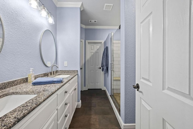6645 Valley View Rd, Rogers, AR 72758 - full bathroom featuring crown molding, double vanity, baseboards, and a textured wall