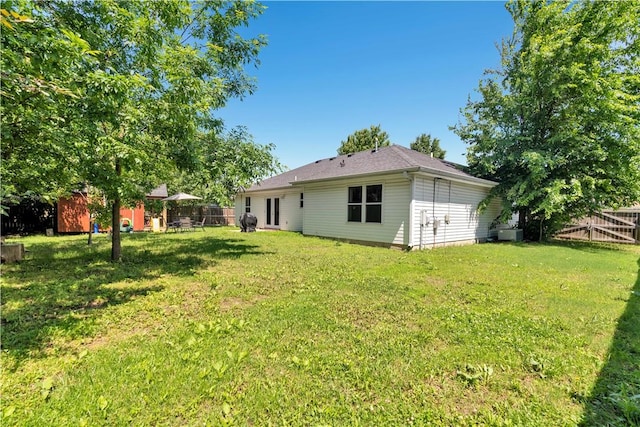 679 Richland Creek Ave, Elkins, AR 72727 - view of yard with central AC and an outbuilding