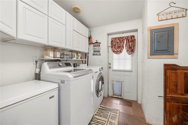18246 Oakridge Rd, Springdale, AR 72764 - laundry room with electric panel, cabinet space, and washer and dryer