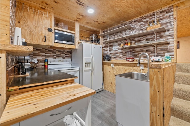 18246 Oakridge Rd, Springdale, AR 72764 - kitchen featuring white appliances, open shelves, wooden counters, a sink, and backsplash