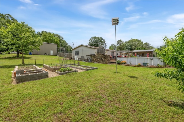 18246 Oakridge Rd, Springdale, AR 72764 - view of green lawn featuring a garden