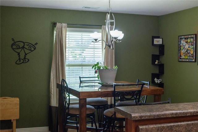 609 Buffalo Ln, Springdale, AR 72764 - dining area with a chandelier and baseboards