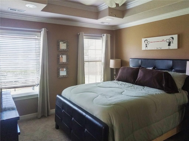 609 Buffalo Ln, Springdale, AR 72764 - bedroom featuring light colored carpet, crown molding, a tray ceiling, and baseboards