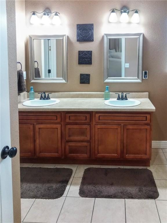 609 Buffalo Ln, Springdale, AR 72764 - bathroom featuring double vanity and tile patterned floors