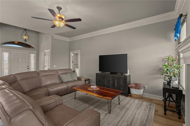 1021 Harvest St, Centerton, AR 72719 - living area with ceiling fan, light wood-type flooring, baseboards, and ornamental molding