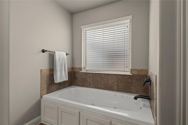 1021 Harvest St, Centerton, AR 72719 - full bathroom featuring a whirlpool tub