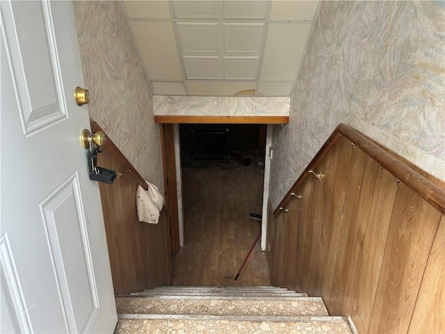 13888 White Oak Ln, Bentonville, AR 72712 - stairway featuring wood finished floors