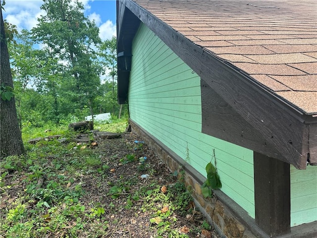 13888 White Oak Ln, Bentonville, AR 72712 - view of home's exterior with a shingled roof