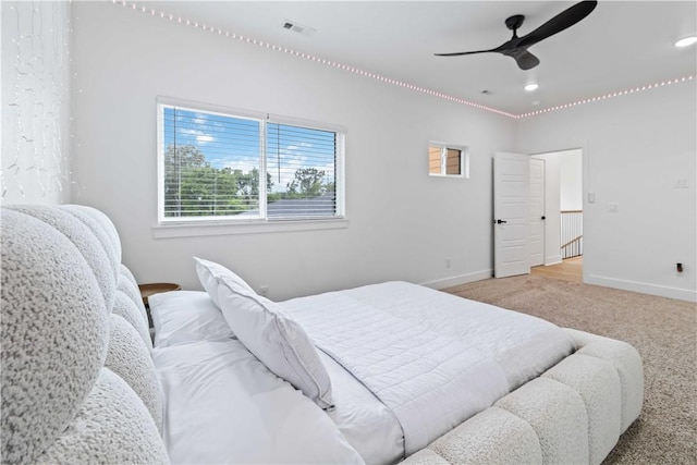 204 NE Healing Springs St, Bentonville, AR 72713 - carpeted bedroom with baseboards, a ceiling fan, and recessed lighting